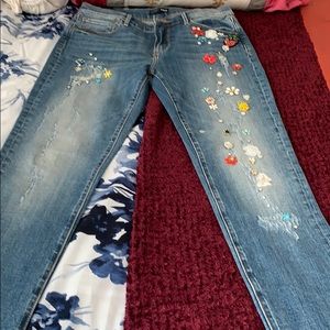 Stylish blue jeans with embroideries